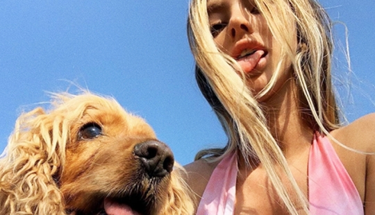Beautiful girls and their four-legged friends: 25 photos