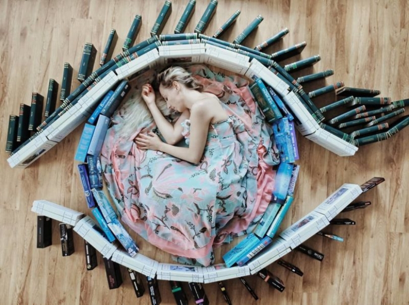 Books as art: a girl puts out colorful installations from her library