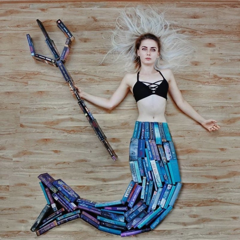 Books as art: a girl puts out colorful installations from her library Books as art: a girl puts out colorful installations from her library