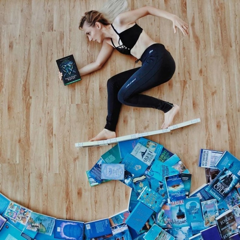 Books as art: a girl puts out colorful installations from her library Books as art: a girl puts out colorful installations from her library