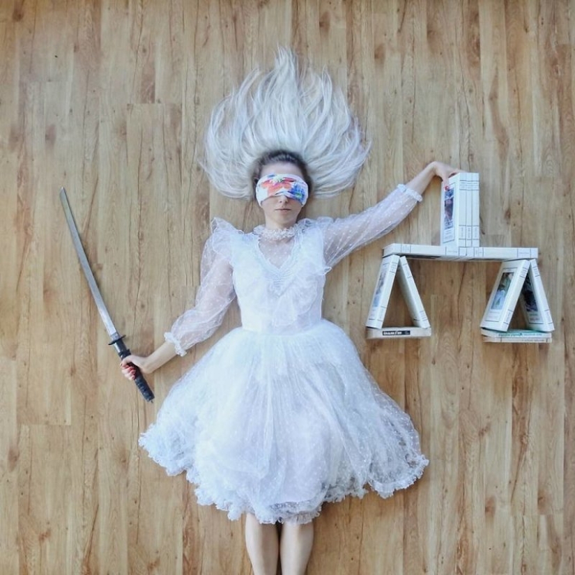 Books as art: a girl puts out colorful installations from her library Books as art: a girl puts out colorful installations from her library