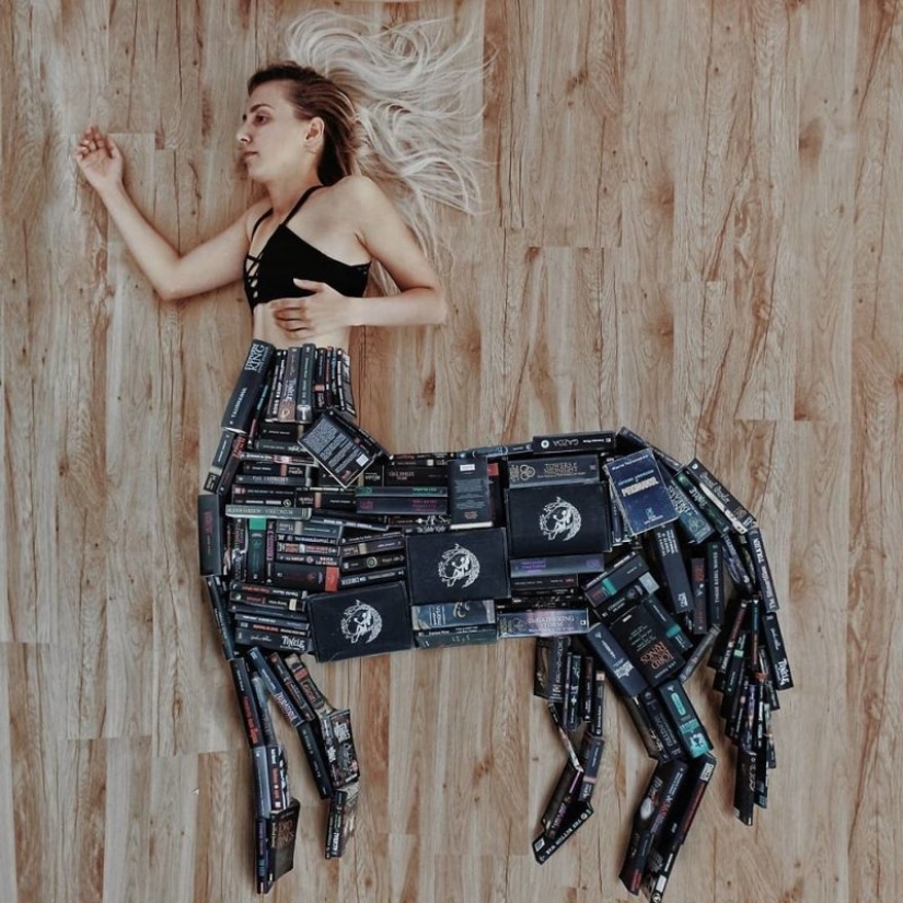 Books as art: a girl puts out colorful installations from her library Books as art: a girl puts out colorful installations from her library