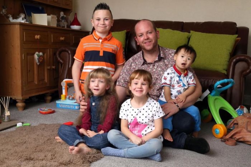 British gay adopted four disabled children and is immensely happy