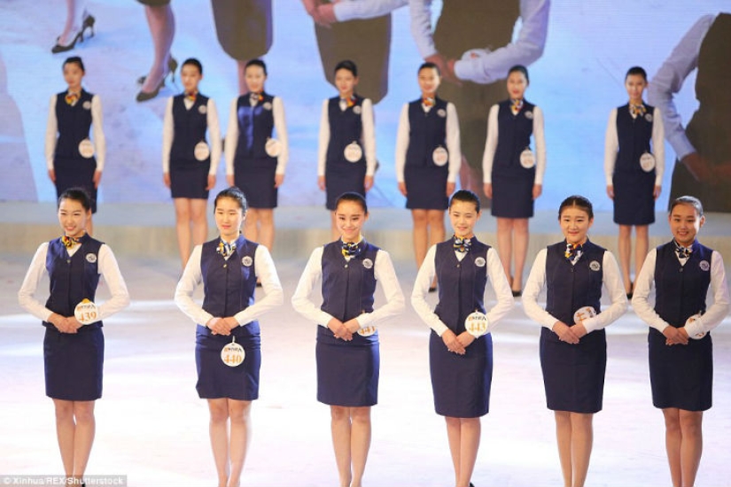 Chinese schoolgirls pose in bikinis hoping to become a flight attendant or model Chinese schoolgirls pose in bikinis hoping to become a flight attendant or model