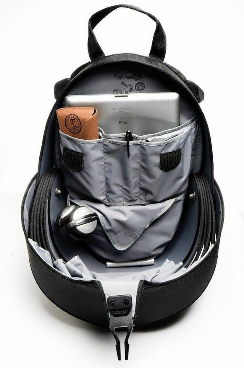 Designers from Colombia have created a backpack-shell of old tires Designers from Colombia have created a backpack-shell of old tires