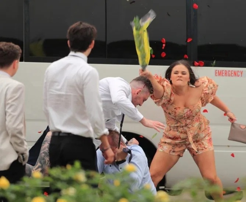 Don't wake the beast in her: a girl whipped a bully with a bouquet during a mass brawl at a horse race in Australia