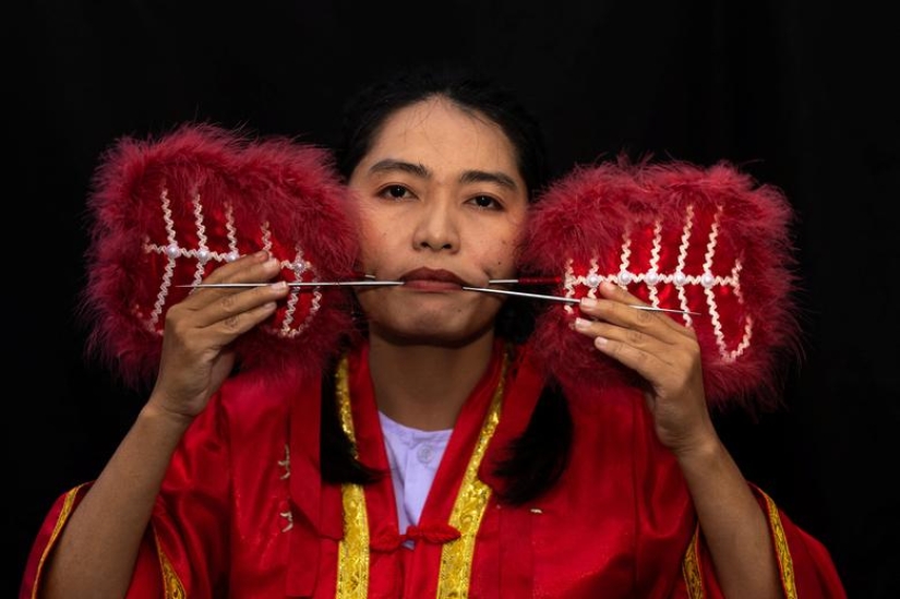 Extreme piercings put devotees in soul-cleansing trance at Thai festival Extreme piercings put devotees in soul-cleansing trance at Thai festival