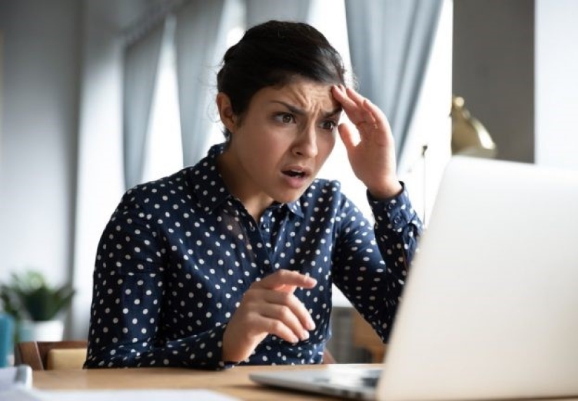 How are the "troll factories" organized and how much are their employees paid