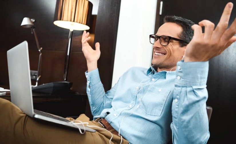 How are the "troll factories" organized and how much are their employees paid