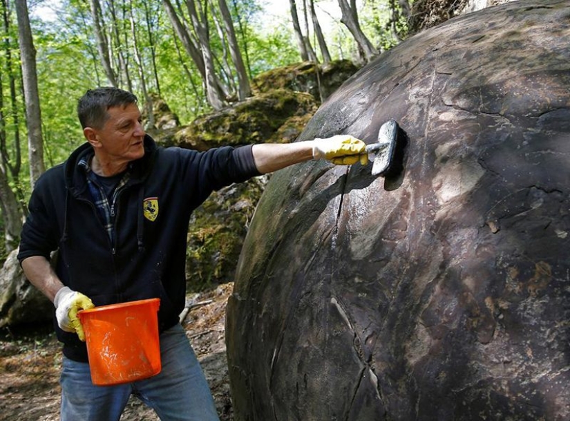 Huge stone ball in the middle of the forest