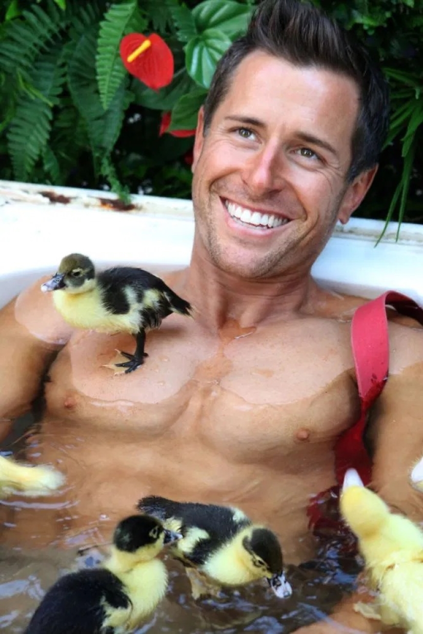 Incendiary photo shoot: hot Australian firefighters filmed with cute animals for calendar