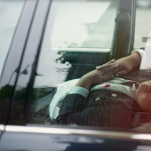 Japanese taxi drivers sleeping in the middle of the street in the middle of the day in William Green's photo series