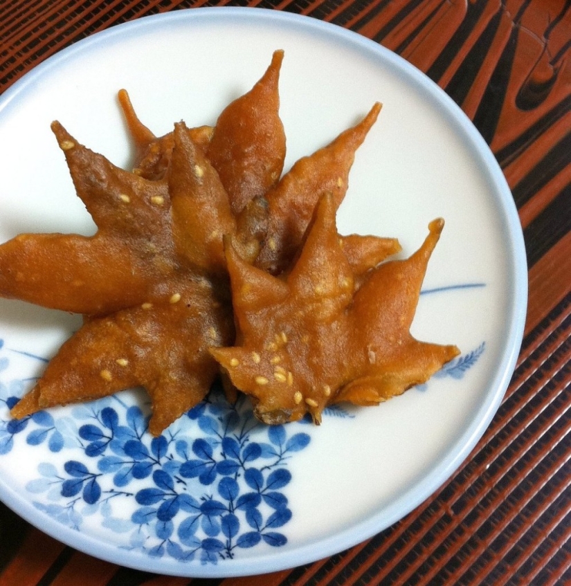 Leaves of maple in a deep fryer Leaves of maple in a deep fryer