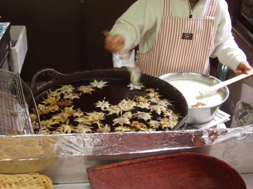 Leaves of maple in a deep fryer Leaves of maple in a deep fryer