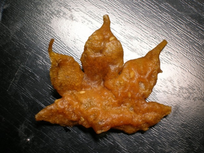Leaves of maple in a deep fryer Leaves of maple in a deep fryer