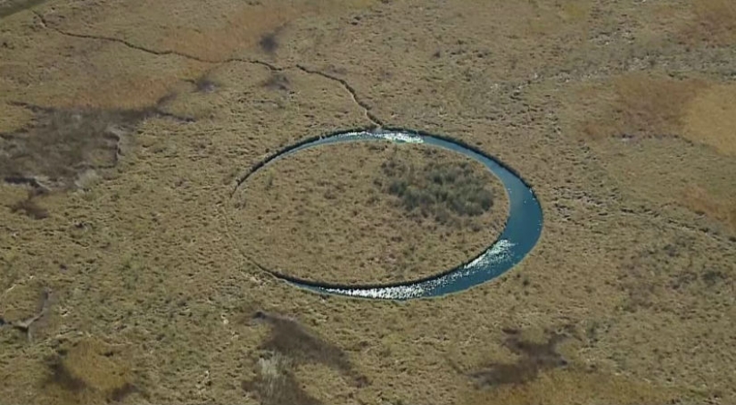 Locals say an ancient deity lives there: a perfectly round lake with a floating island excites the minds of scientists