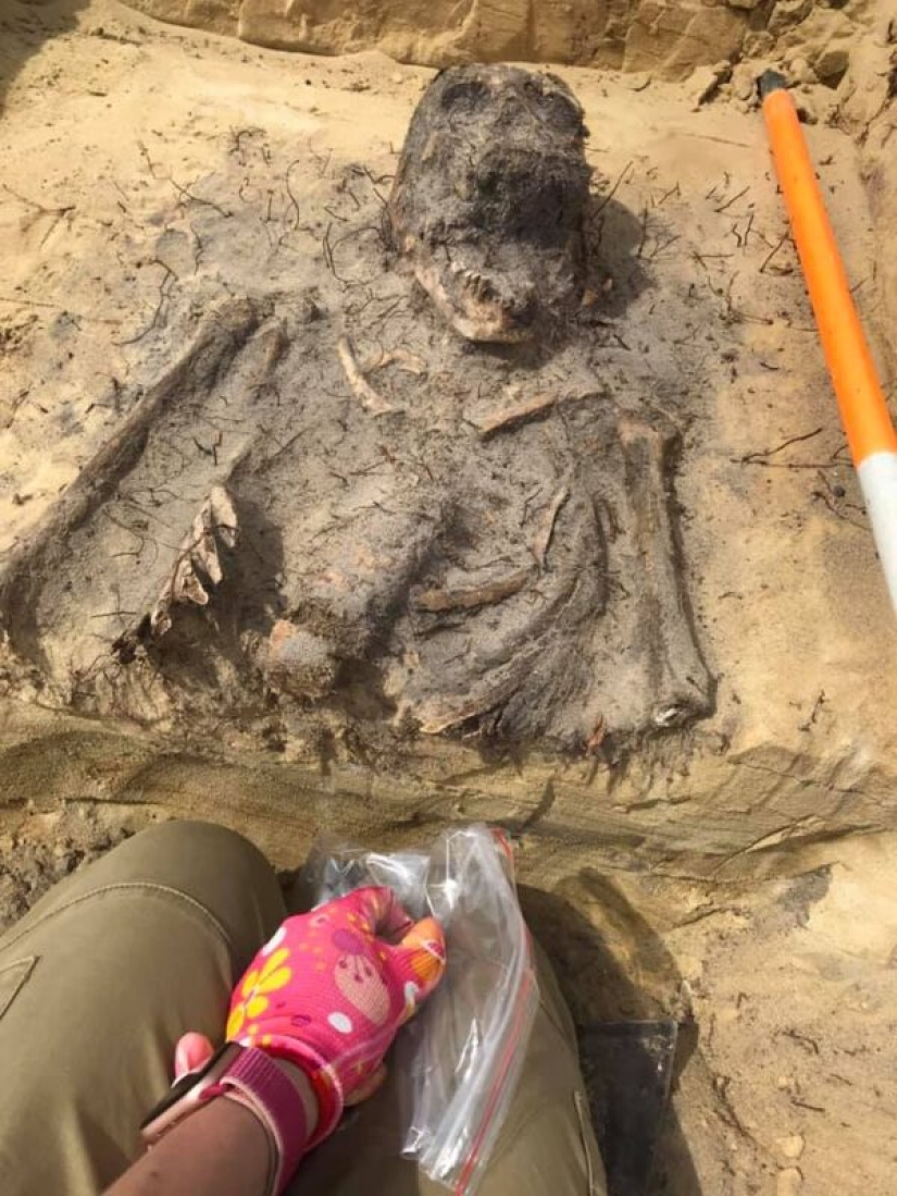 Mass burial of children with coins in their mouths found in Poland