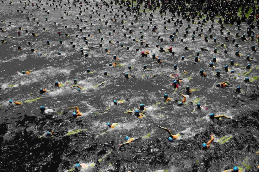 Mass swim blue caps in Lake Zurich Mass swim blue caps in Lake Zurich