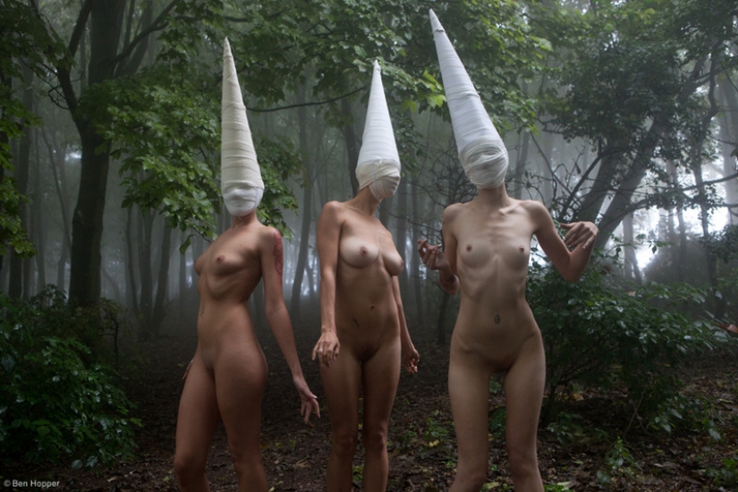 Naked girls in masks by Ben Hopper