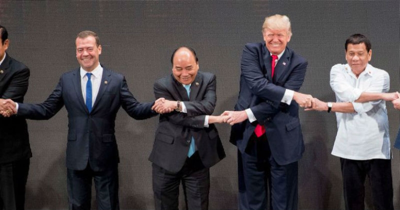 Neither Trump nor Medvedev coped with the group handshake