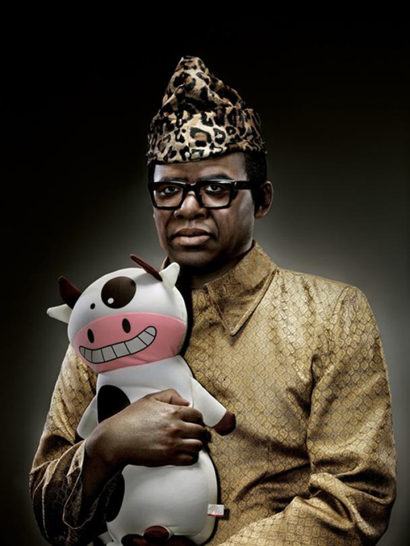 Portraits of world dictators hugging soft toys