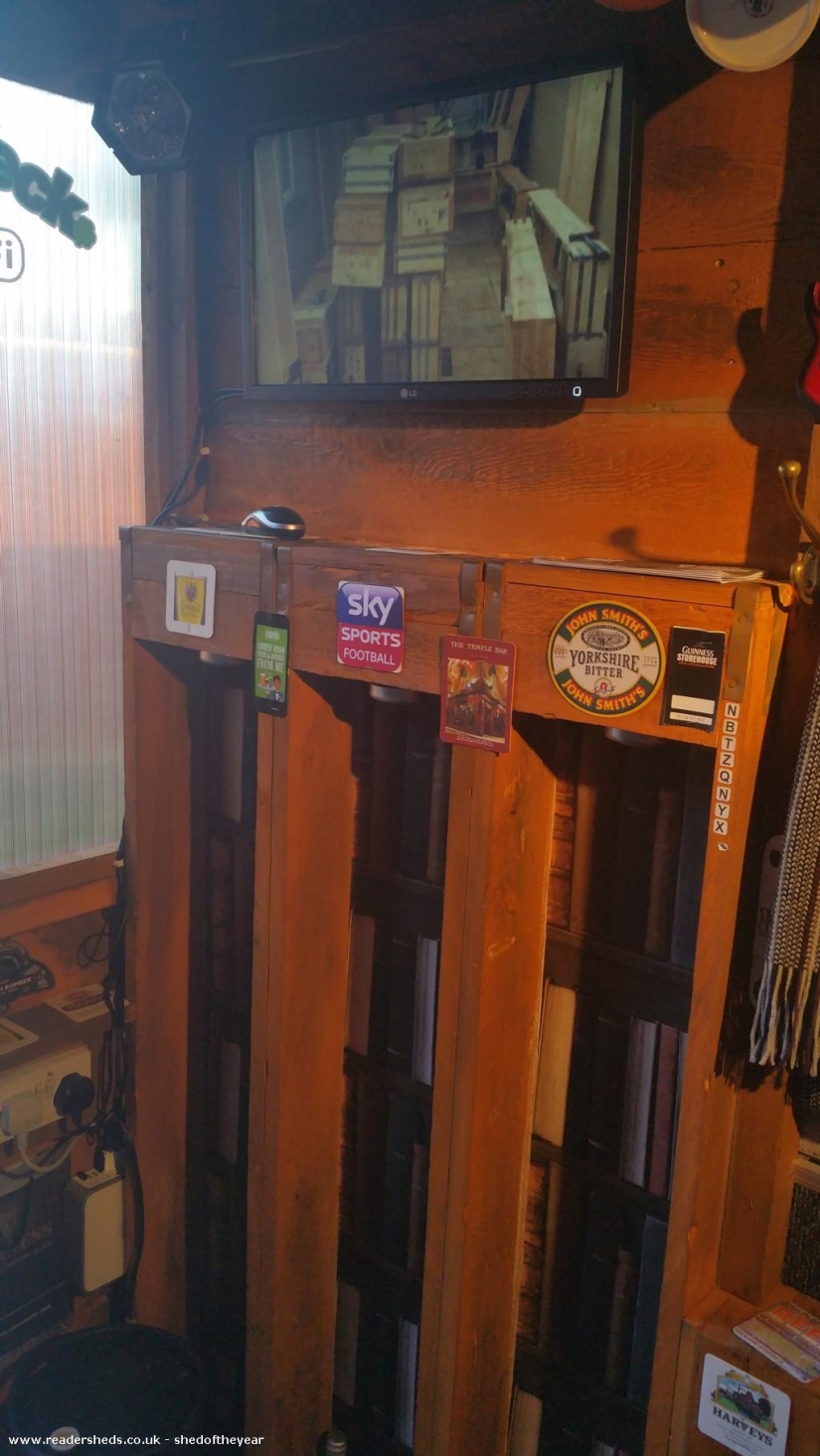 The neighbors built their own pub in the narrow space between the houses The neighbors built their own pub in the narrow space between the houses