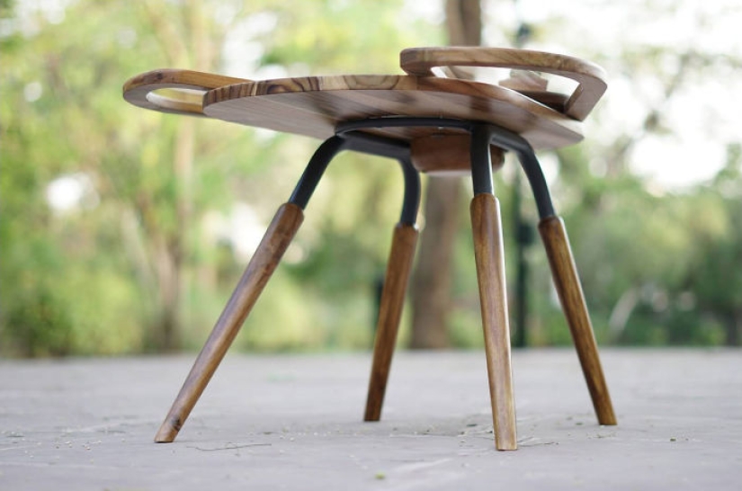 This unique table was inspired by the wings of a beetle. This unique table was inspired by the wings of a beetle.