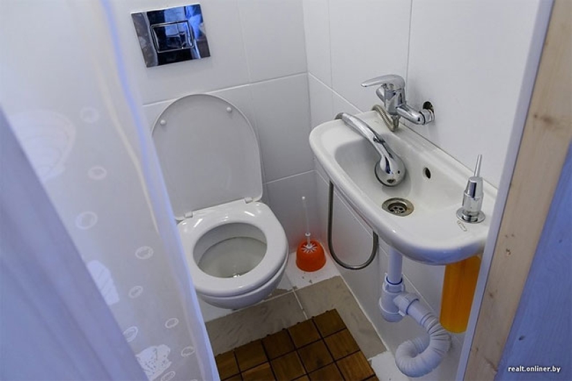 Three Belarusians and a dog live in a house with an area of 16 square meters Three Belarusians and a dog live in a house with an area of 16 square meters