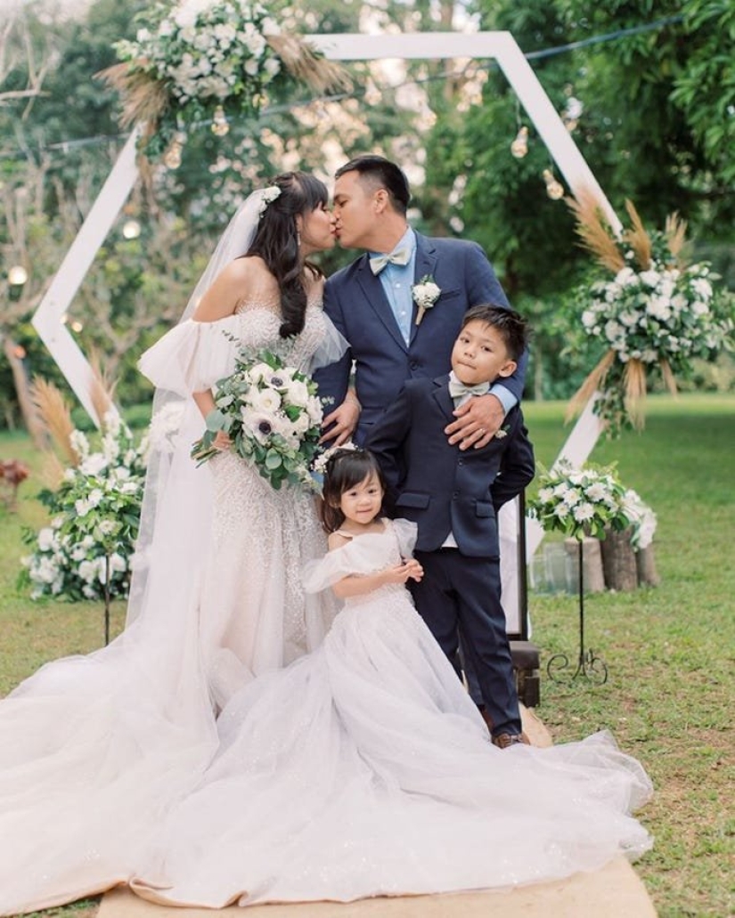 Wedding ceremony against the backdrop of an erupting volcano in the Philippines