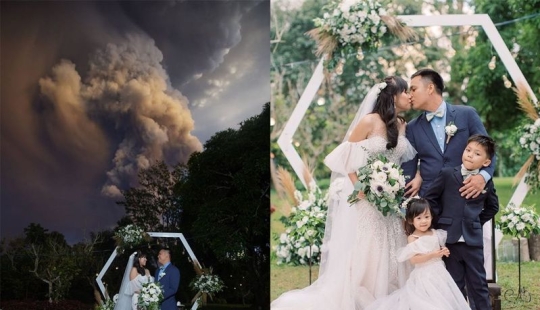 Wedding ceremony against the backdrop of an erupting volcano in the Philippines