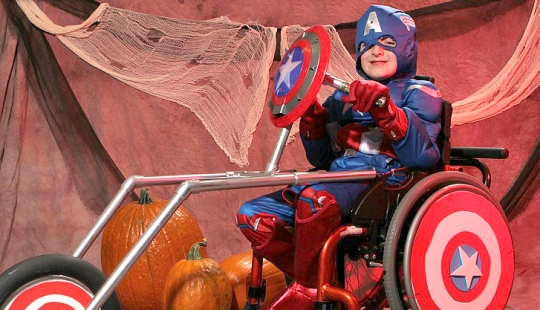 A father creates costumes for his son's wheelchair