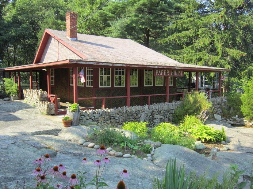 A house where everything is from newspapers: walls, furniture, and even curtains