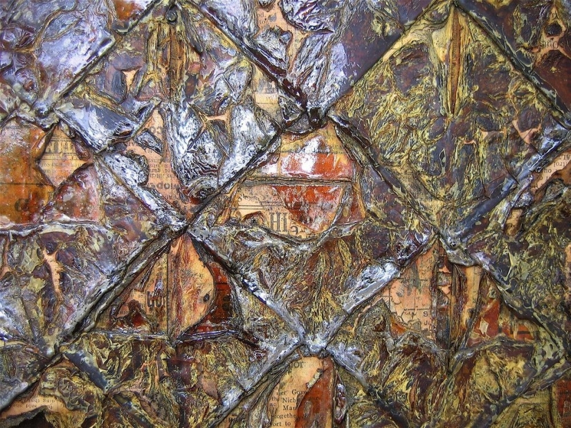 A house where everything is from newspapers: walls, furniture, and even curtains