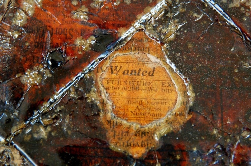 A house where everything is from newspapers: walls, furniture, and even curtains