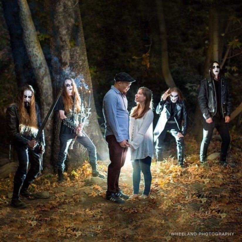 A metal band accidentally participated in an engagement photo shoot of a couple in love A metal band accidentally participated in an engagement photo shoot of a couple in love