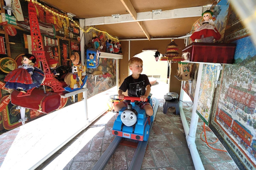 An engineer grandfather built an amusement park in the backyard for his grandchildren An engineer grandfather built an amusement park in the backyard for his grandchildren