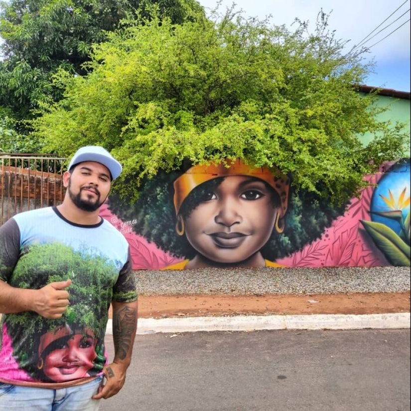 Artista callejero continúa pintando retratos en paredes junto a árboles que también sirven como cabello
