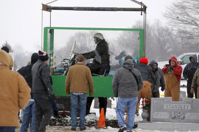 Biker buried riding a Harley