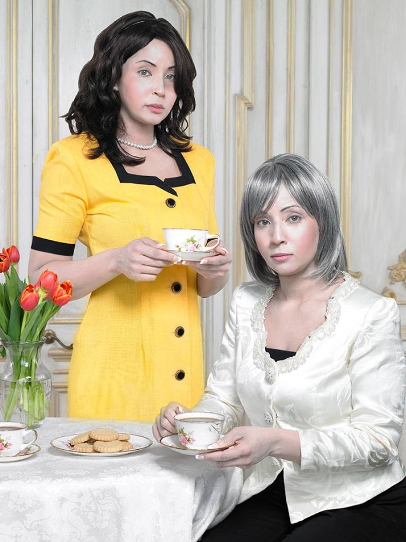 Black and white photo: a mulatto woman takes pictures of herself in the image of her white ancestors