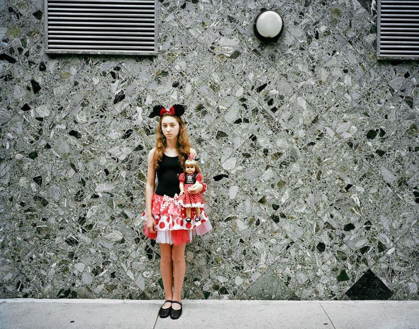 Children&#39;s fashion: girls and their dolls