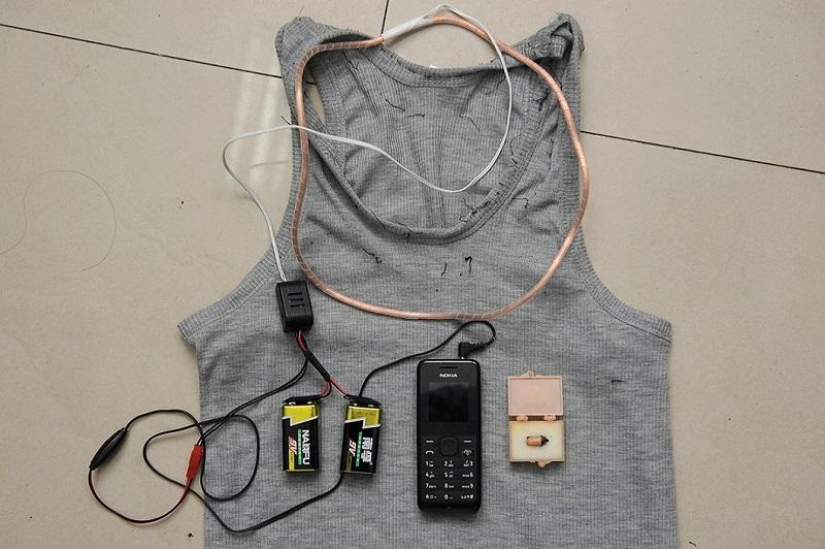 Chinese police showed devices that applicants tried to use to pass exams