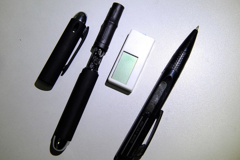 Chinese police showed devices that applicants tried to use to pass exams