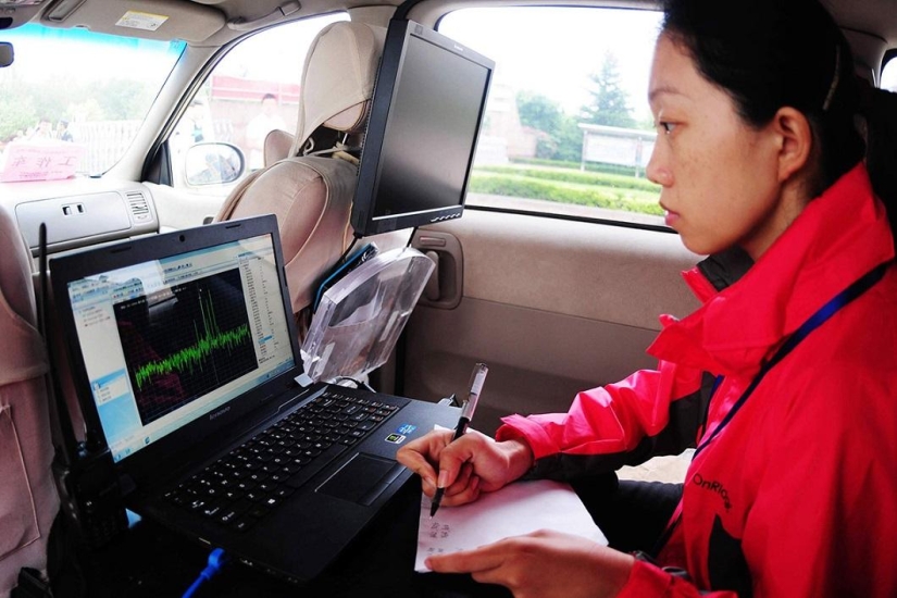 Chinese police showed devices that applicants tried to use to pass exams