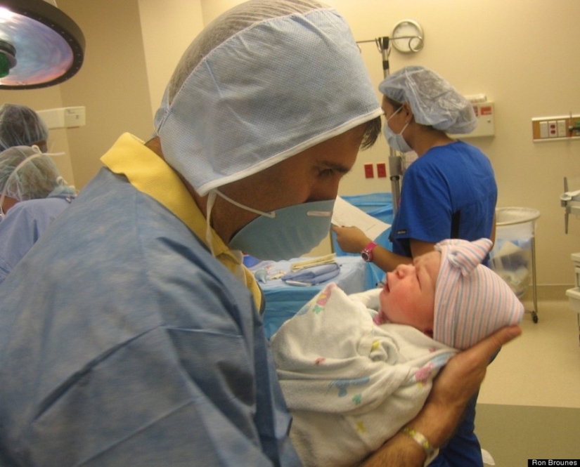 Dads see their newborn babies for the first time