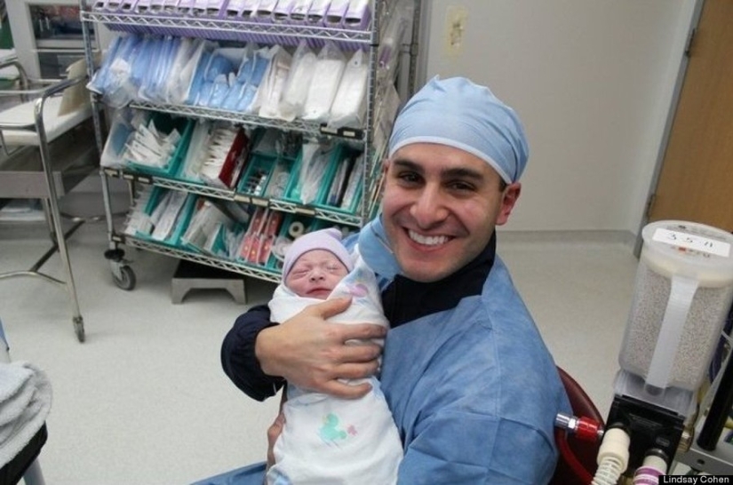 Dads see their newborn babies for the first time