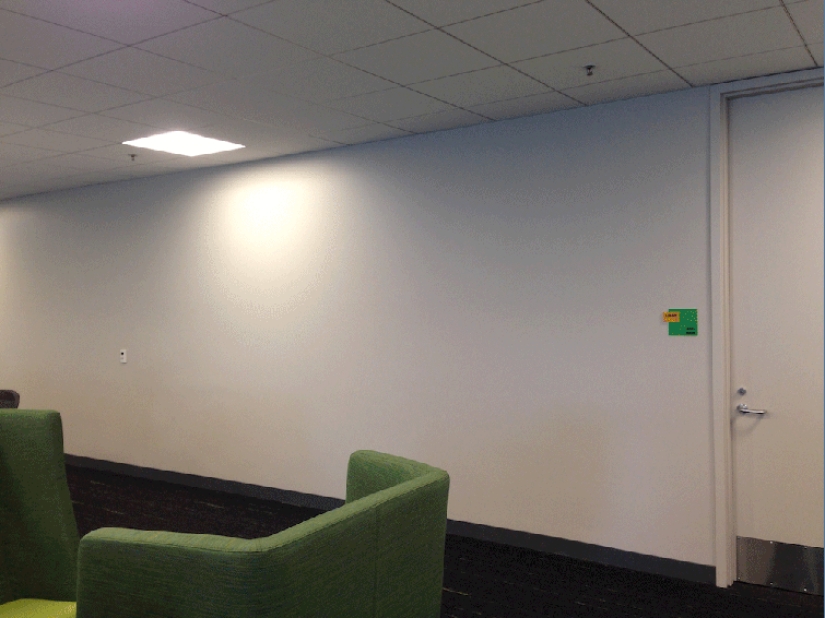 Employees used 8024 stickers to transform boring office walls into a superhero mural