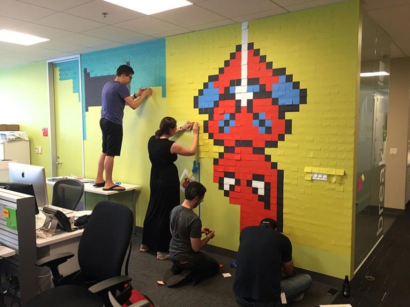 Employees used 8024 stickers to transform boring office walls into a superhero mural