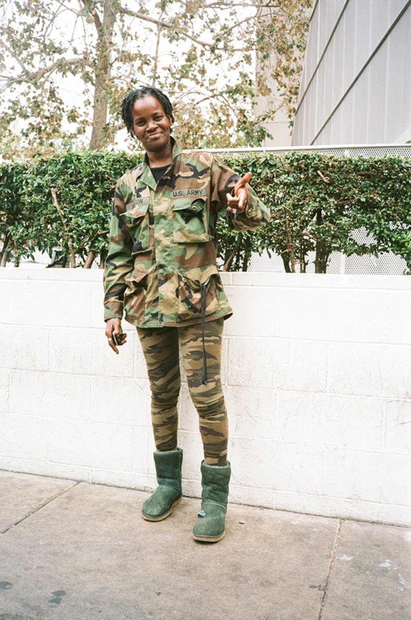 Hipsters are resting - in the frame are inhabitants of the outskirts, unmercenaries and homeless people