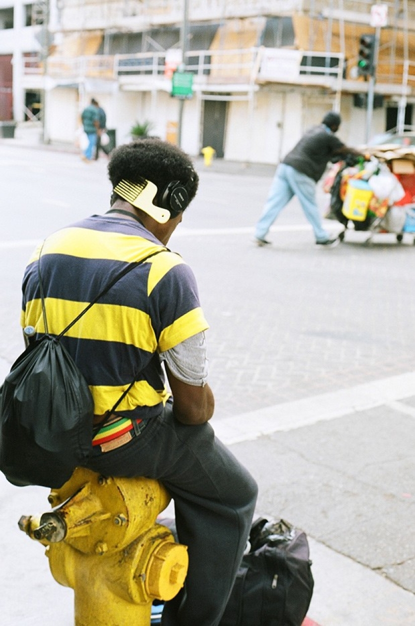 Hipsters are resting - in the frame are inhabitants of the outskirts, unmercenaries and homeless people