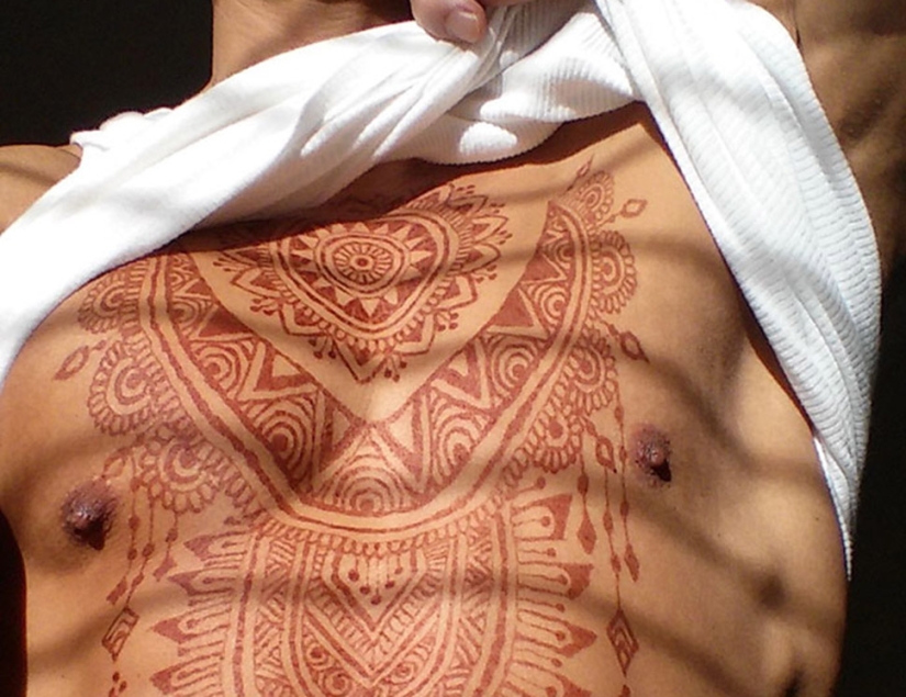 Men also do henna tattoos, and it's very sexy
